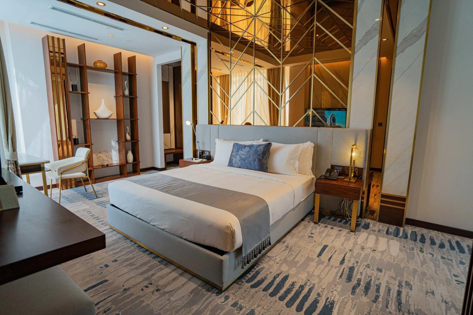 Velero Hotel Doha Lusail Bagian luar foto A bedroom at the hotel